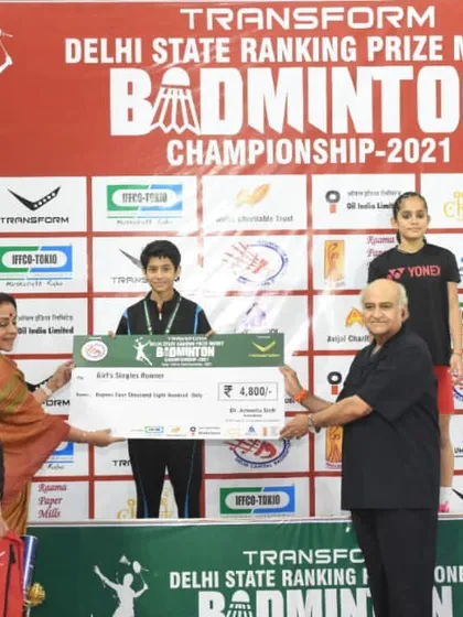 Prasidhi Gupta receiving her prize for securing the runner-up position in the Girls Singles U-13 category at the Delhi State Ranking Championship.