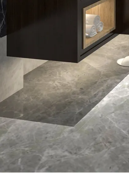The floating design of this vanity is highlighted here, showing the under-cabinet space and subtle floor lighting. This not only makes the bathroom feel larger but also makes cleaning easier, combining style with practicality.