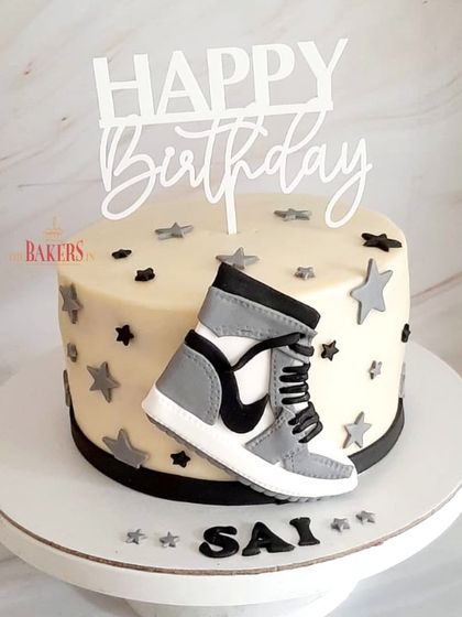 For a sneaker fan! This cool cake features a handcrafted, edible Nike sneaker. It's a minimal-fondant design that's perfect for a stylish birthday celebration.