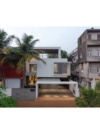 The house as seen from the street, showing its relationship with the neighboring buildings. Our design aims to be a contemporary addition that respects the scale of the neighborhood.