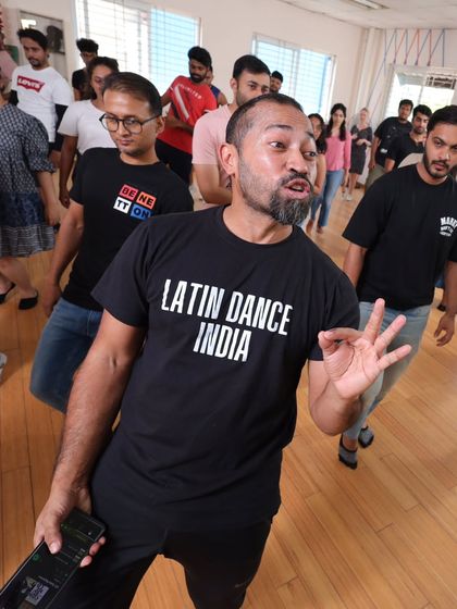 Sai explaining a fine point of technique to the class. We are passionate about teaching the right way, so you build good habits from day one.