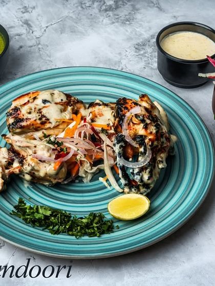 Our Arabi Tandoori offers a different take on the classic. The chicken is marinated in a creamy white sauce with Arabic spices, resulting in a juicy and flavourful dish.