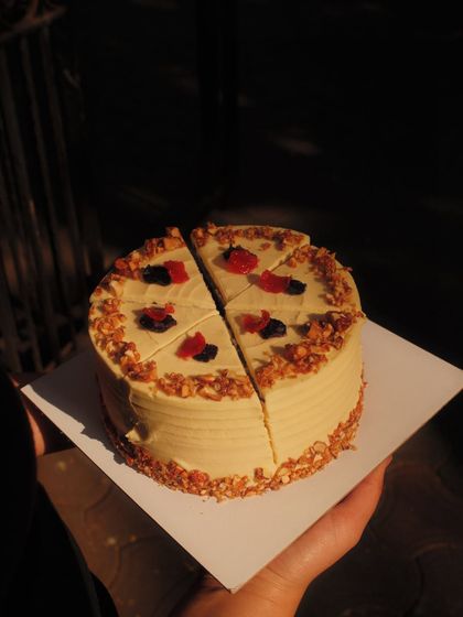 Our Dilli Carrot Cake, a winter special, held up in the beautiful winter sun.