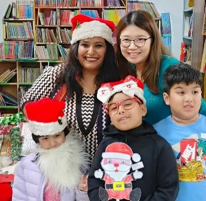 Smiles and festive props all around! Our Christmas event is a time for fun, photos, and making happy memories with new and old friends at the library.