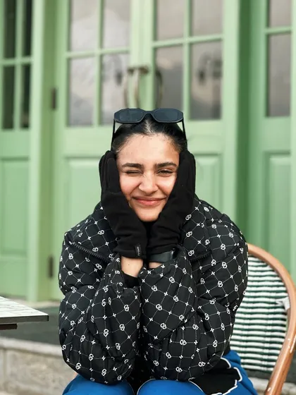 A cozy, bundled-up portrait from a cafe in Srinagar, Kashmir.