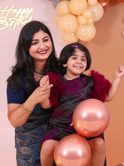 A magical 'Princess' themed birthday party, with elegant decor, shimmering backdrops, and royal props, making every little girl feel like royalty.