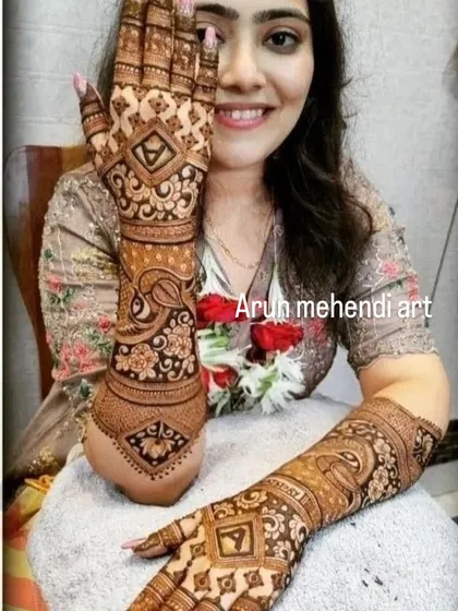 This design showcases a variety of patterns, from geometric grids to paisley and floral elements, creating a rich and diverse look.