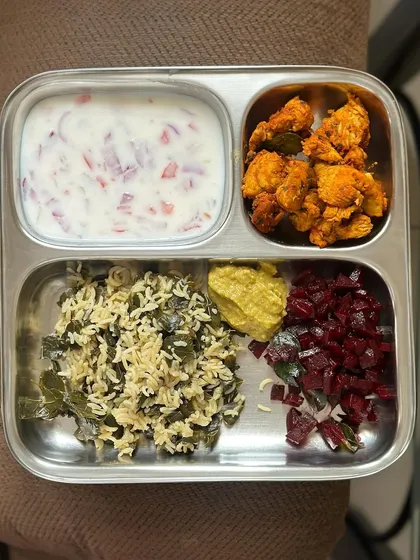 An example of an imperfect but still healthy meal. Sometimes my plates aren't perfectly balanced, and that's okay. This one has moringa leaf rice, chicken 65, and beetroot palya. Progress over perfection.