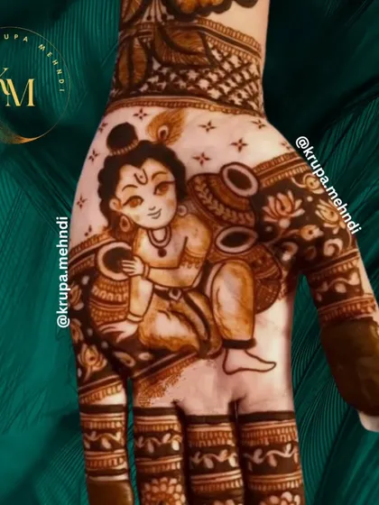 Another adorable portrait of Bal Krishna with his pot of butter. The innocence and charm of this design make it a favorite for Janmashtami.