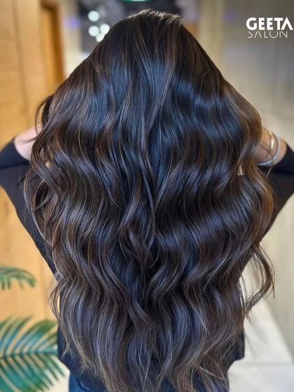 A dark, almost black base with subtle, ashy highlights, creating a sophisticated and modern look.