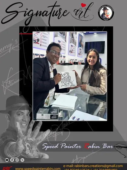 Presenting a framed signature artwork to a happy client at a Hansaplast event in Dehradun.