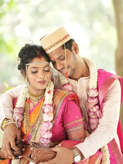An intimate moment between the bride and groom. Her soft glam makeup looks flawless up close.