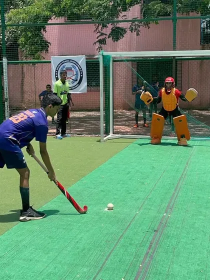 A close-up of a player's form during a penalty stroke. I pay close attention to details like grip, body shape, and follow-through.