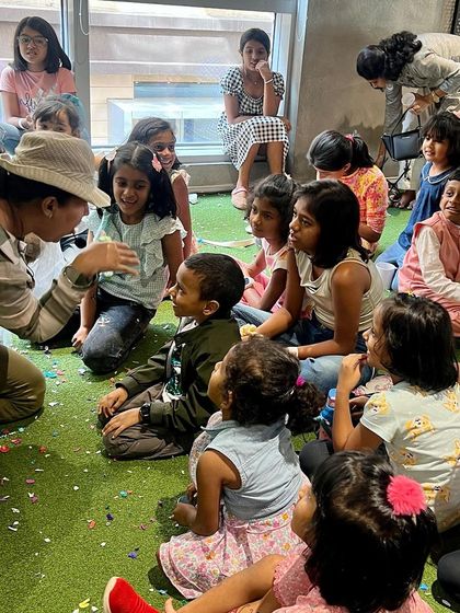 Here I am in action, right in the middle of the fun. Interacting directly with the kids and seeing their reactions up close is a huge part of my performance style.