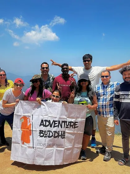 Our group at the top of a Kodaikanal viewpoint, celebrating a successful trip.