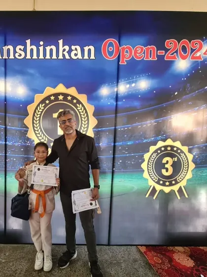 Our coaches being recognized as officials at the Sanshinkan Open Karate Championship. We are honored to contribute to the sport.