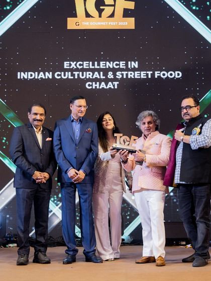 Our team on stage accepting the Gold award for 'Excellence in Indian Cultural & Street Food Chaat'. A fantastic achievement for our dedicated 'Art of Chaat' team.