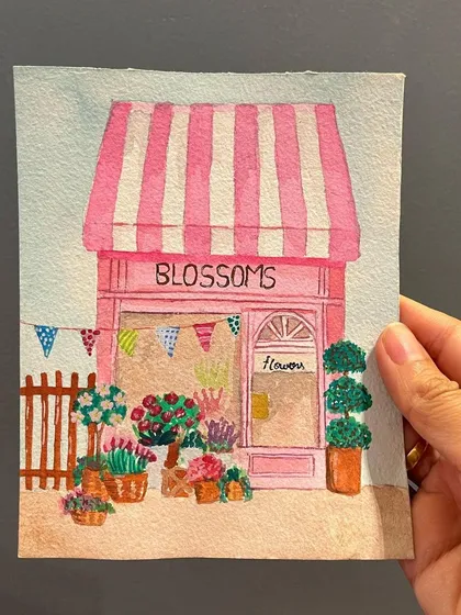 I'm so happy with how this mini watercolor of a whimsical flower shop turned out. It's a perfect little piece of art to brighten up a desk, shelf, or any small corner that needs a pop of color.