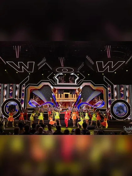 This shot captures the grand scale of the WOW Awards stage. Our choreography was designed to fill this massive space, using every inch to create a dynamic and immersive experience for the audience.