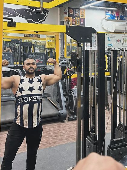 Bicep check. A strong bicep peak is built with a variety of curling exercises and proper form.