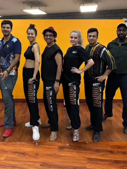 A photo of our team and students at our newly renovated Shivalik studio. The energy and camaraderie are what define us.