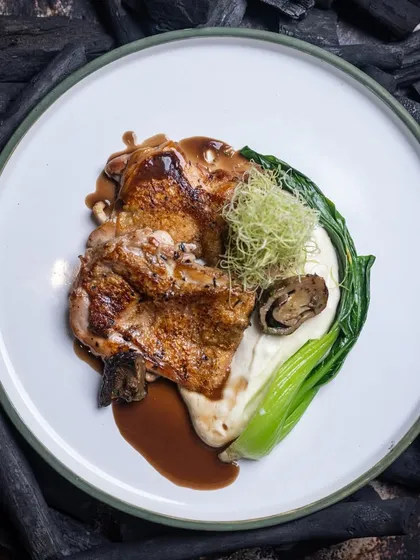 The absolutely irresistible Grilled Chicken, perfectly plated and ready to be enjoyed.