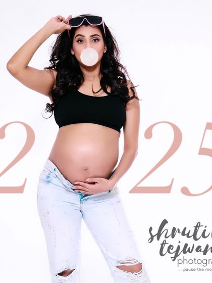 For the modern, new-age mom. This fun and edgy maternity shot with bubblegum and ripped jeans is for the mom who wants to break stereotypes and celebrate her pregnancy her way.