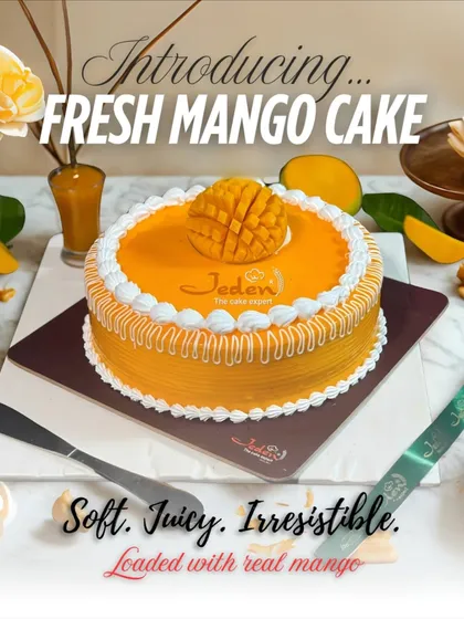We celebrate mango season with our Fresh Mango Cake. This dessert features soft vanilla sponge, light whipped cream, and a generous topping of fresh, juicy Alphonso mango, capturing the true taste of summer.