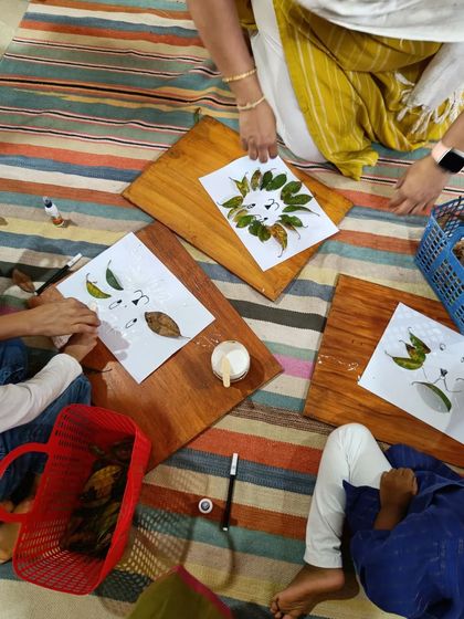 Using leaves collected from a nature walk, children create their own "Little Vinayaka" art. We love incorporating natural materials into our crafts to connect kids with the world around them.