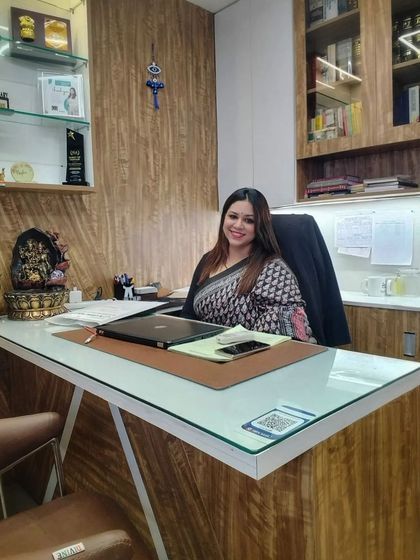 Smiling after the storm. This photo in my office represents the peace and resilience earned through adversity. It's a reminder that after weathering the worst, there is quiet triumph and hope.