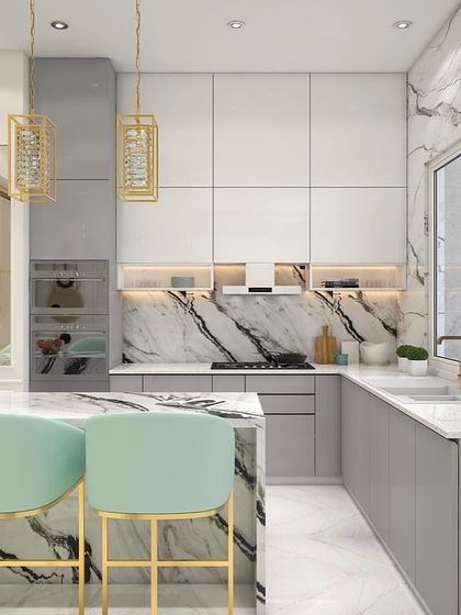 A timeless kitchen design featuring a panda marble island and backsplash. The mint green bar stools add a soft pop of color to the otherwise neutral palette of white and grey.
