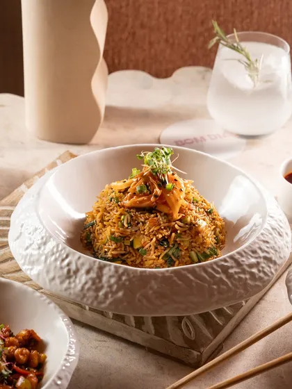 Kimchi fried rice from Bom Dia, showcasing their beautiful, custom-textured crockery.