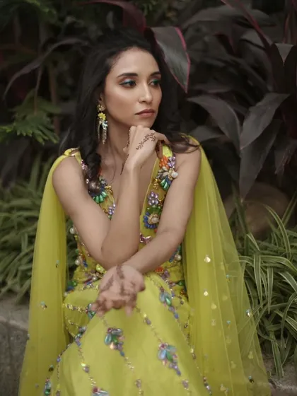 A vibrant and fresh look perfect for a Mehendi ceremony. I used a pop of color on the eyes to complement the bright outfit, paired with glowing skin and a natural lip to create a look that is both festive and elegant.