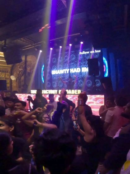 The dance floor at Sugar Factory is a whirlwind of movement. My audio-visual set is designed to keep this energy going all night.