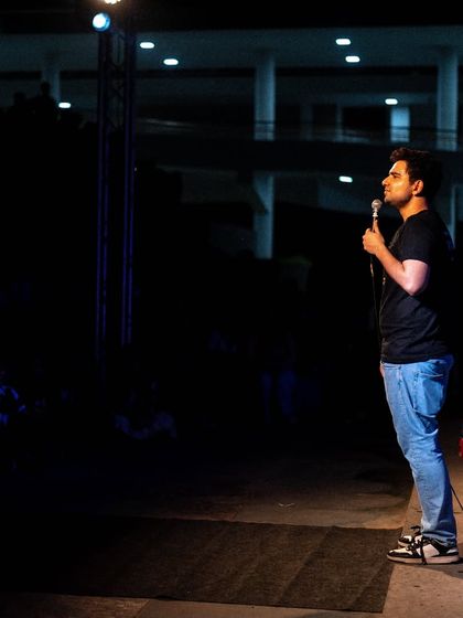 A side view of the stage setup for Samay Raina's comedy show at IIM Trichy.