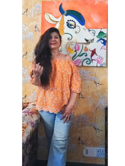 Here I am with my Nandi bull painting, a piece that represents strength, faith, and receptivity. I love creating art that is not only beautiful but also holds deep spiritual meaning, ready to bring its unique energy into your space.