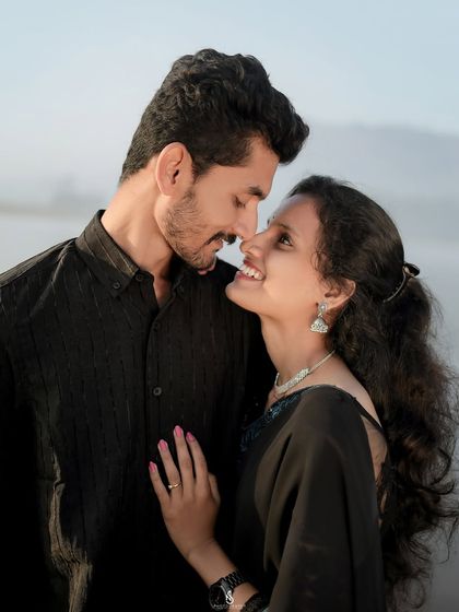 A close-up portrait capturing a look of pure affection. The soft, natural light is perfect for highlighting these intimate expressions.