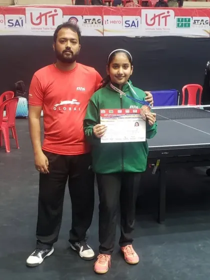 Coach with Akanksha Singhal after she won a bronze medal in the U-13 Girls Singles at the National Championship.