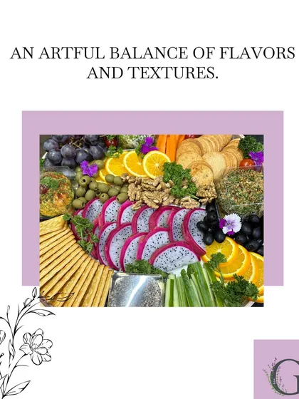 "An artful balance of flavors and textures." This image displays a colorful platter with fresh dragon fruit, oranges, nuts, and crackers, centered around our cheese and dips.