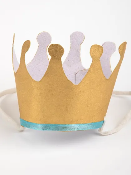 A product shot of the gold and blue birthday crown.
