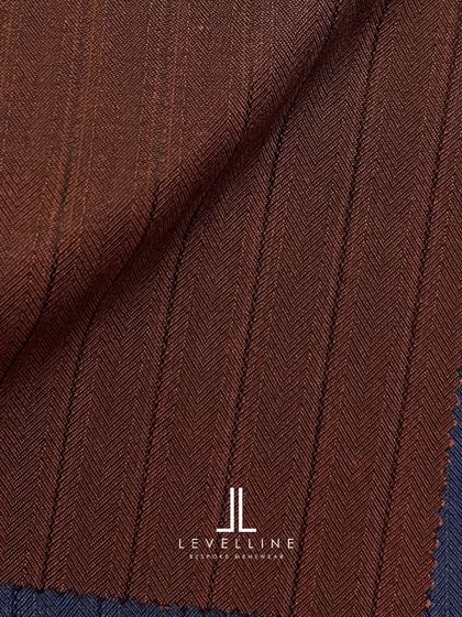 A close-up of a brown herringbone stripe fabric, offering a unique texture and pattern for a standout suit.