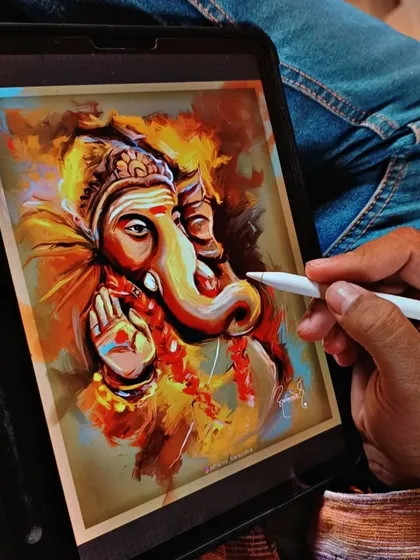 Art is my prayer. Here you can see me creating a digital painting of Lord Ganesha on my tablet. I use bold, expressive strokes and warm colors to convey a sense of divine energy and blessing.