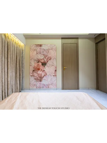 This shot highlights the custom floral art panel opposite the bed, creating a cohesive and artistic theme throughout the room.