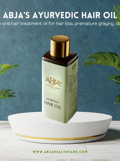 A product shot of my all-in-one Ayurvedic Hair Oil, a treatment for hair loss, premature greying, and dandruff.