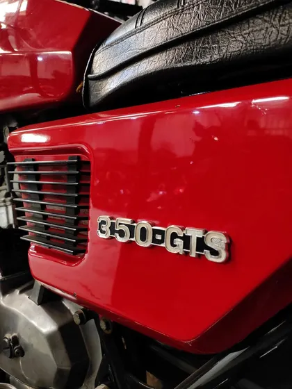 The side panel of the Moto Guzzi, proudly displaying its 350 GTS designation.