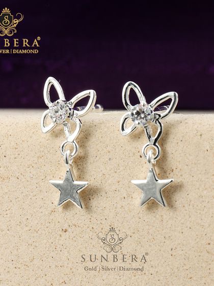 Whimsical silver earrings featuring a butterfly stud and a dangling star charm. The combination of motifs adds a playful and sparkling touch to any look.