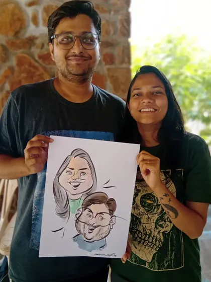 A fun couple caricature drawn live. I focus on exaggerating features in a playful way to create a humorous likeness.