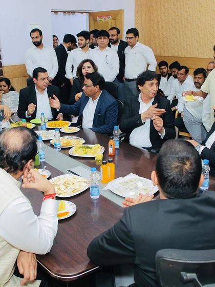 Sharing a meal and conversation with judges and lawyers. These informal gatherings help strengthen the relationship between the bar and the bench.