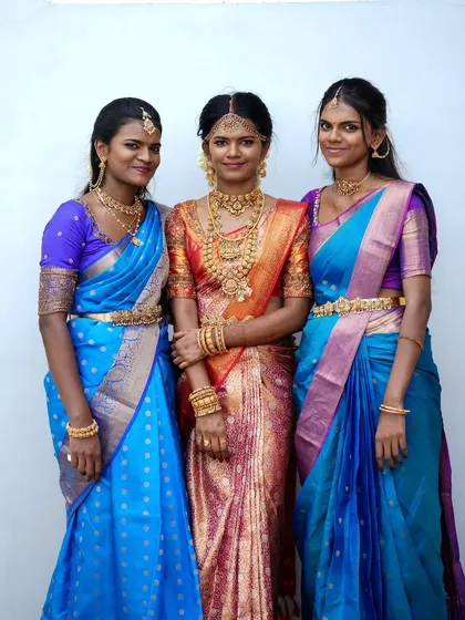 A beautiful shot of the bride and her sisters. I coordinated their looks to complement each other while letting the bride's traditional attire stand out.