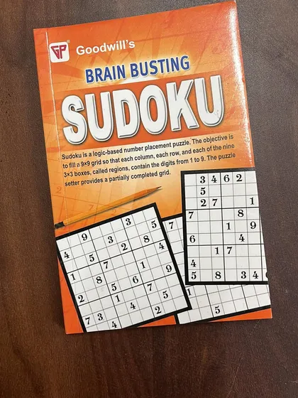 For older kids and even adults, this Brain Busting Sudoku book is a great way to challenge the mind. It's a perfect, screen-free activity to build logic and problem-solving skills.